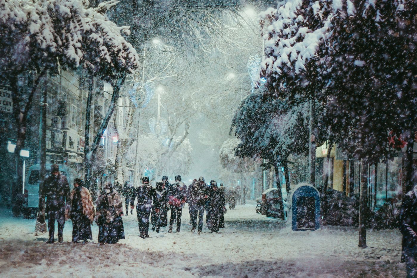 Snow-covered street and townhomes in winter