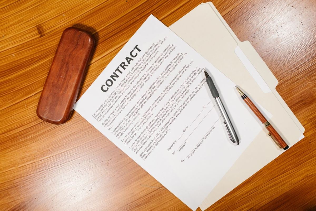 Contract and pen on a desk